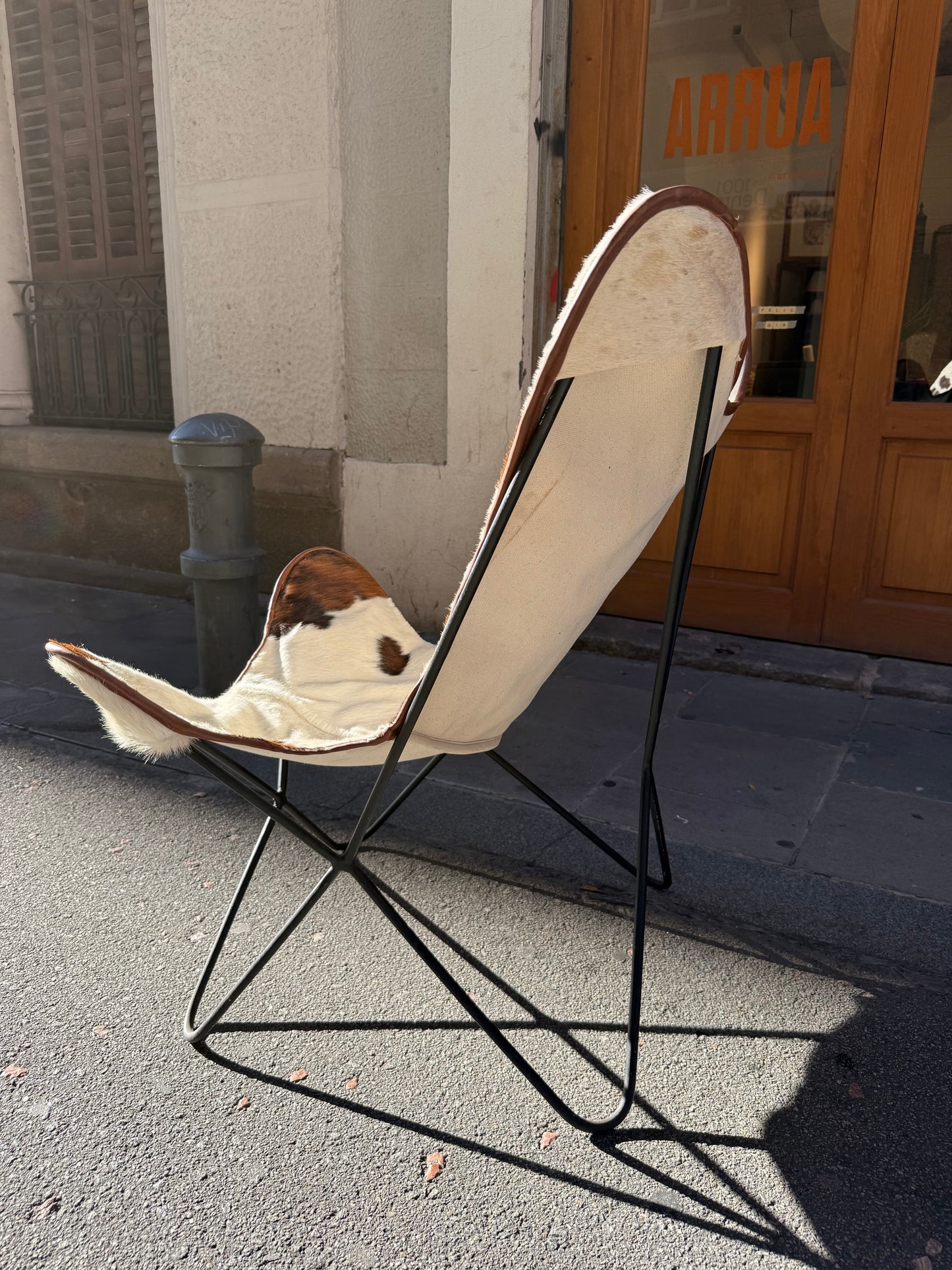 Butaca papallona de pell de vaca