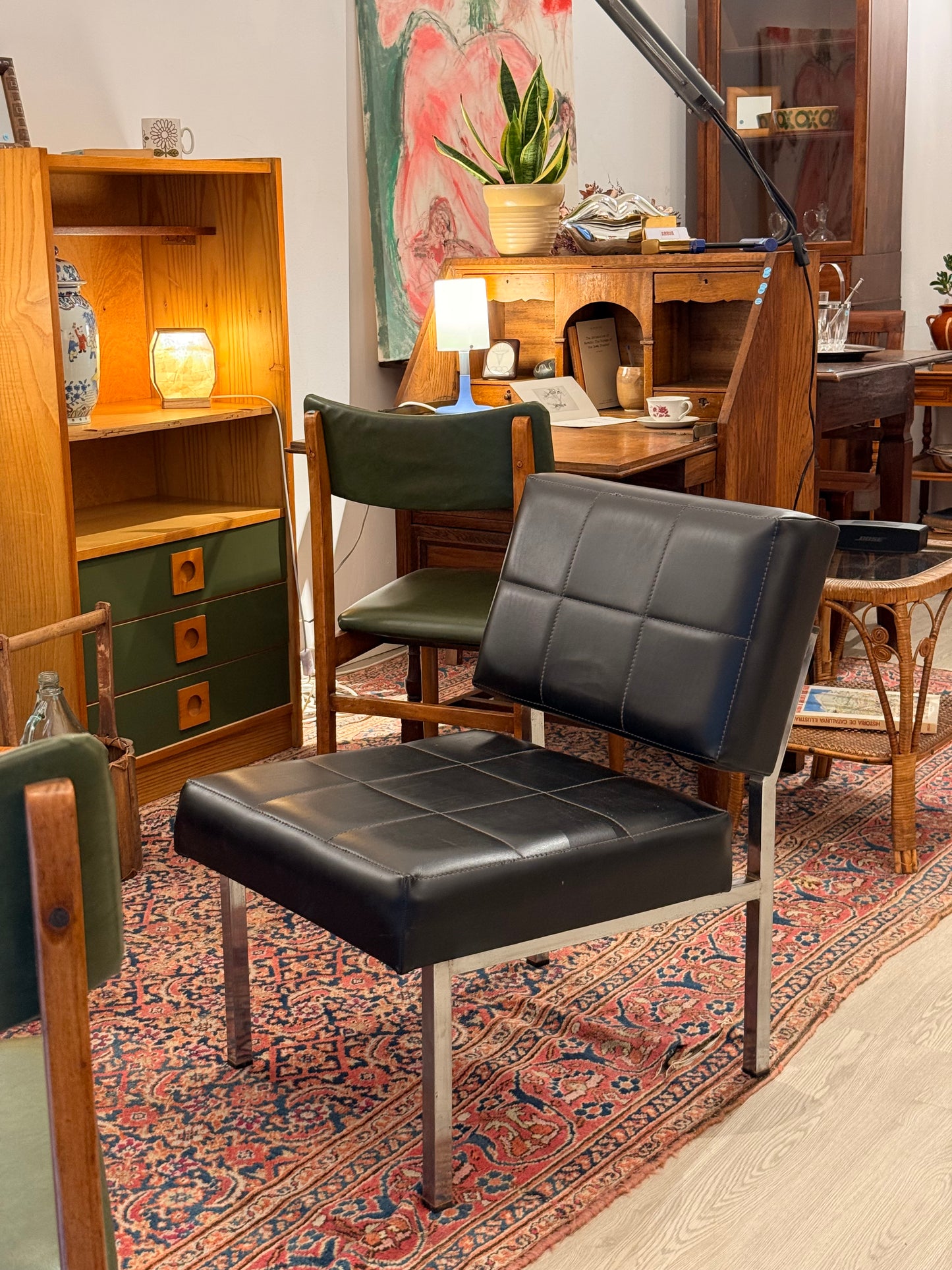 Butaca vintage potes cromades i negre