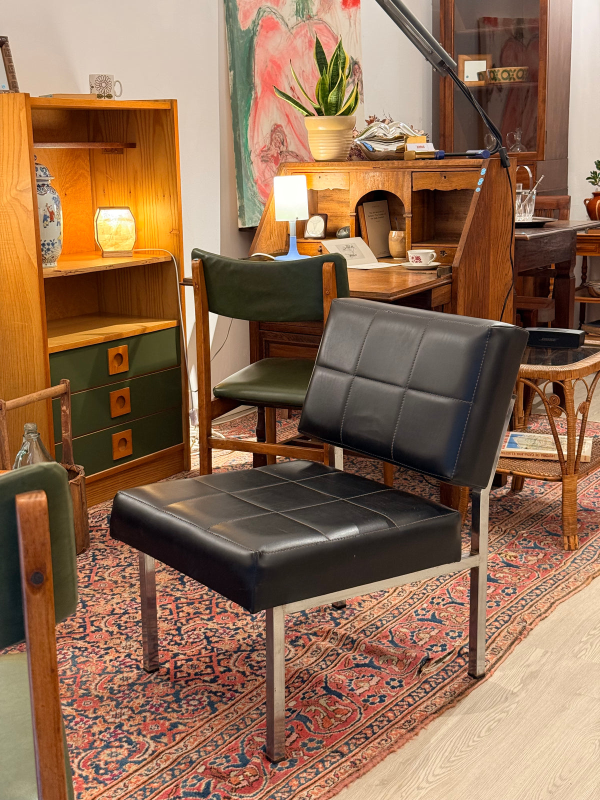 Butaca vintage potes cromades i negre