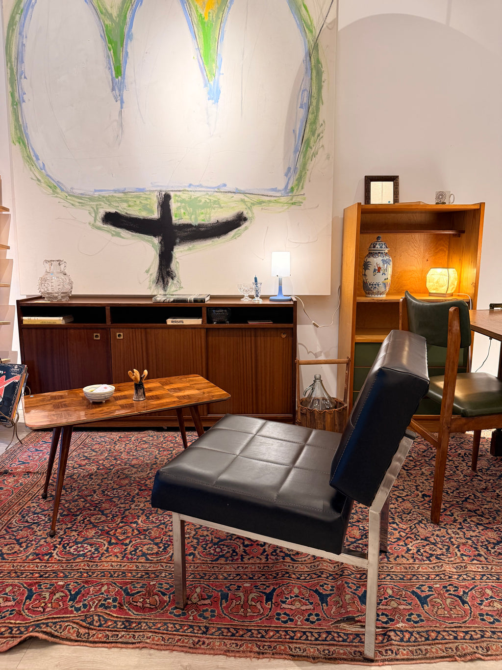 Butaca vintage potes cromades i negre